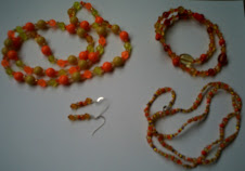 orange set of jewellery