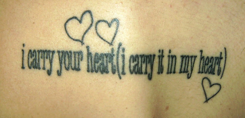 This tattoo, on the upper left side of Katie's back, is more of a  title=