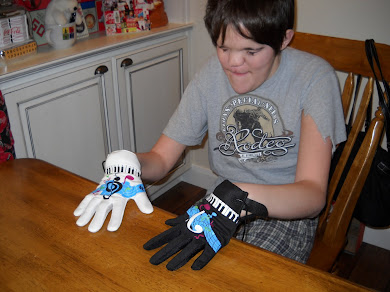 Cody Learning to Play His Electronic Piano Gloves