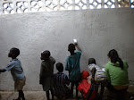 Students and Volunteers Help Our Non-Profit Paint the Community Center in Namaso Bay, Malawi