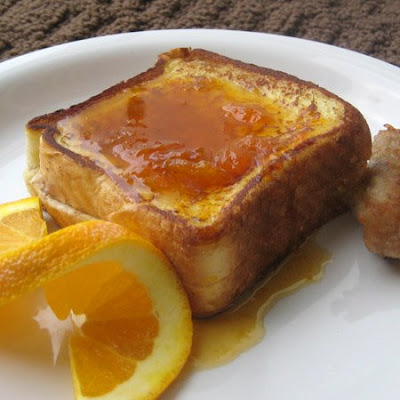 pecan cream cheese stuffed french toast with almond citrus syrup