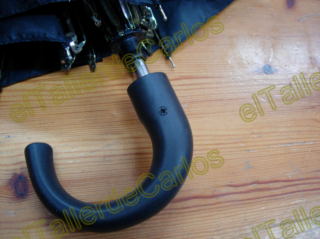 Paraguas reparar mango paraguas. Sustituir de paraguas.