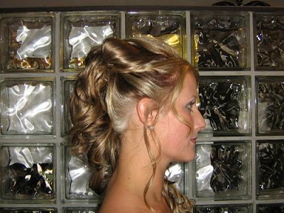 Latest Wedding Updos. I like the small braids sort of hidden underneath the 