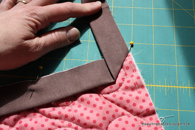 Tutorial on binding a quilt featured by top US quilting blog, Diary of a Quilter