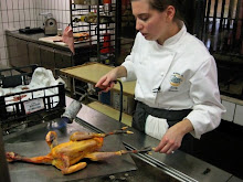 Emily torching Guinea Hen feathers
