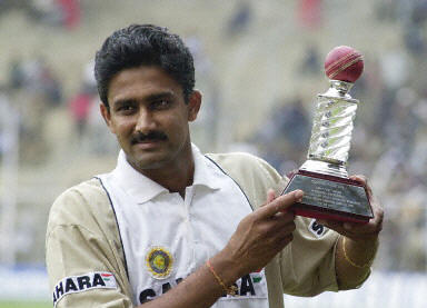[Kumble+with+a+trophy+topped+by+the+ball+he+used+to+capture+his+300th+Test+wicket-790467.jpg]