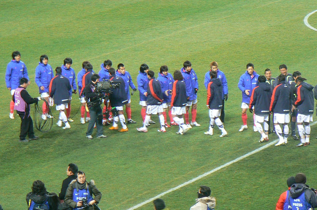 Korea and Chile shake hands