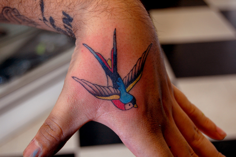 Bird tattoos are often combined with other designs such as stars and hearts