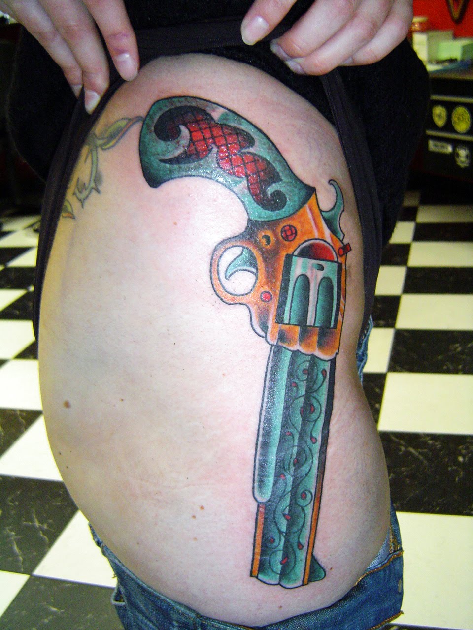 tattoo for girls: Designs Photos: Gun Hip Tattoos