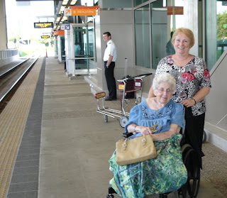 Mom and me waiting for the train