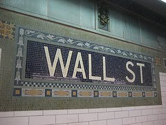 wall street tile mosaic sign in subway station