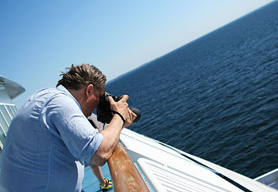 Peder takes photos at the ferry to Denmark