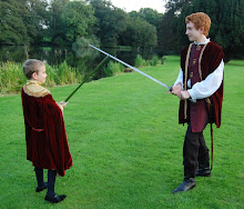 Ben and Peter crossing swords