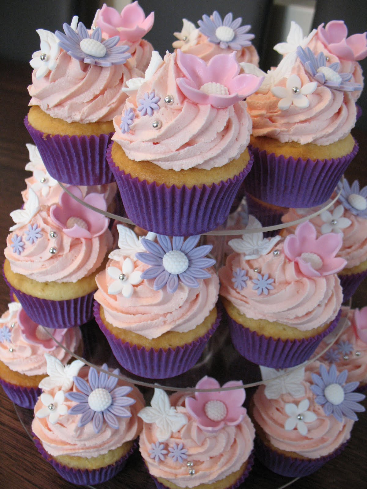 purple and pinnk Daisy Cupcake Tower | Purple cupcakes, Bridal shower ...