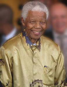 [[Ficheiro:Nelson Mandela-2008 (edit).jpg|thumb|Legenda]]