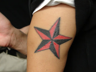 Tattoo Picture: Red and Black Star Tattoo Picture