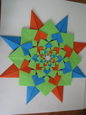 Tomoko Fuse's Origami Quilt Blooming Flowers 1 in Orange, Green, and Blue