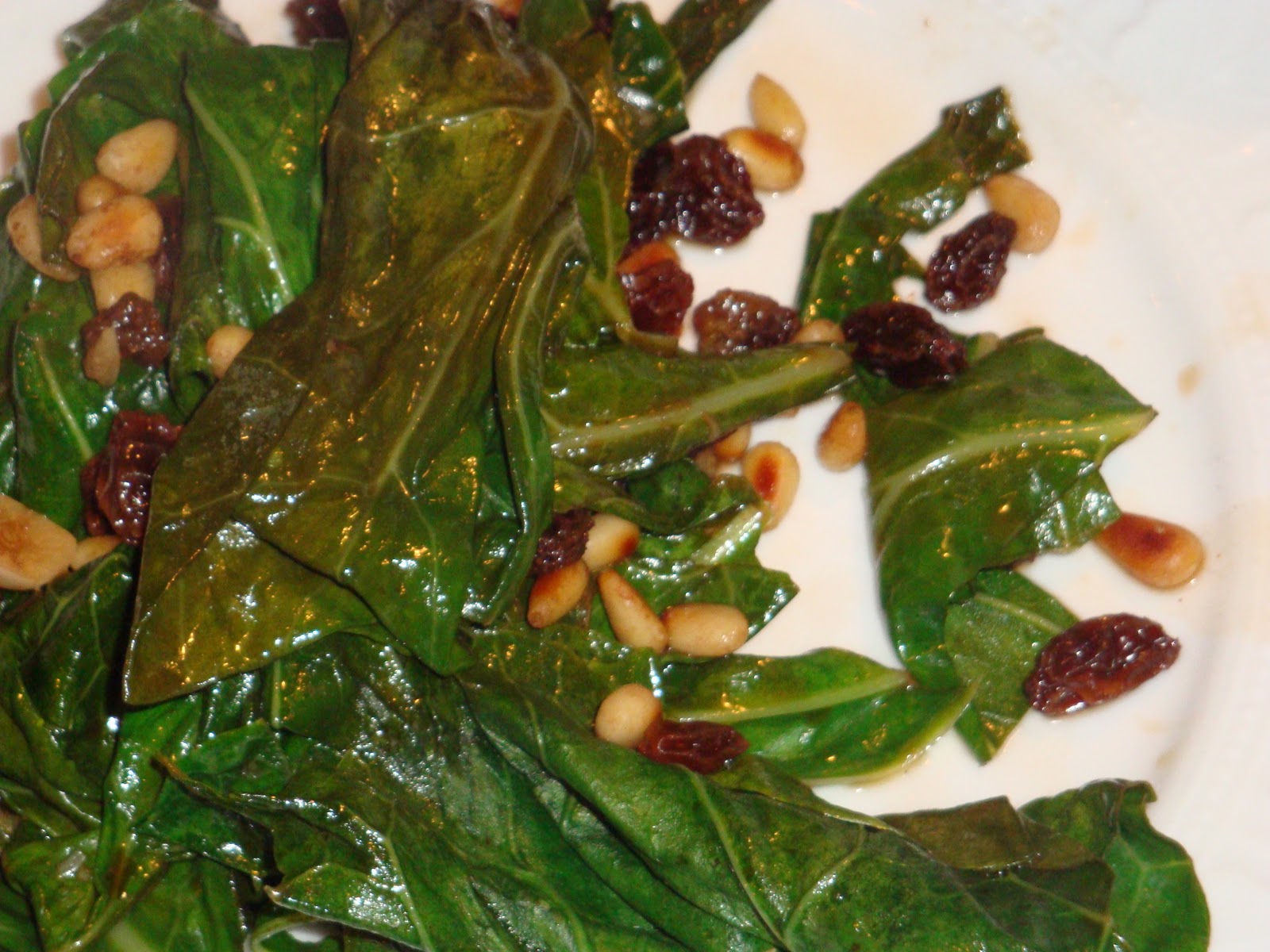 Guerilla Gourmet Sicilian Collard Greens with pine nuts and raisins