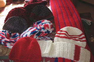 crocheted scarf and hats