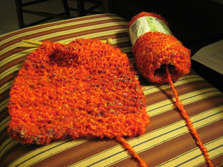 knitted bright and lofty scarf on the needles