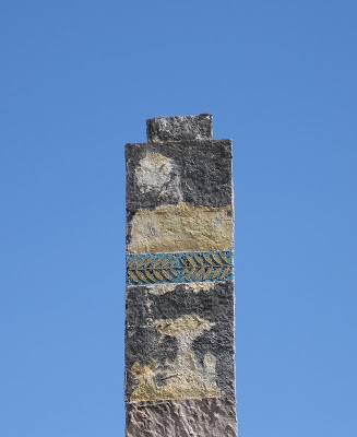 old chimney with worn out decoration