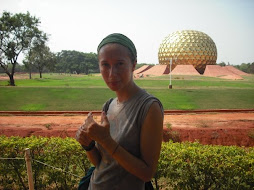 In front of the Matrimandir of Auroville