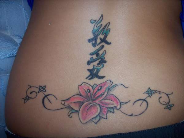 lower back Flower Art Tattoo Design