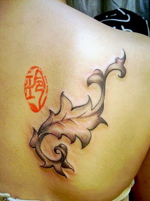 tribal tattoos for upper back. upper back tattoos women