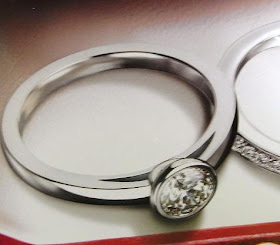 cartier bezel set engagement ring