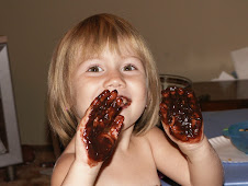 Cora loved the feel of the "squishy" pudding in her fingers!