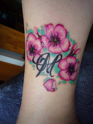 Cool Japanese Cherry Blossom Tattoo On Wrist Picture 3