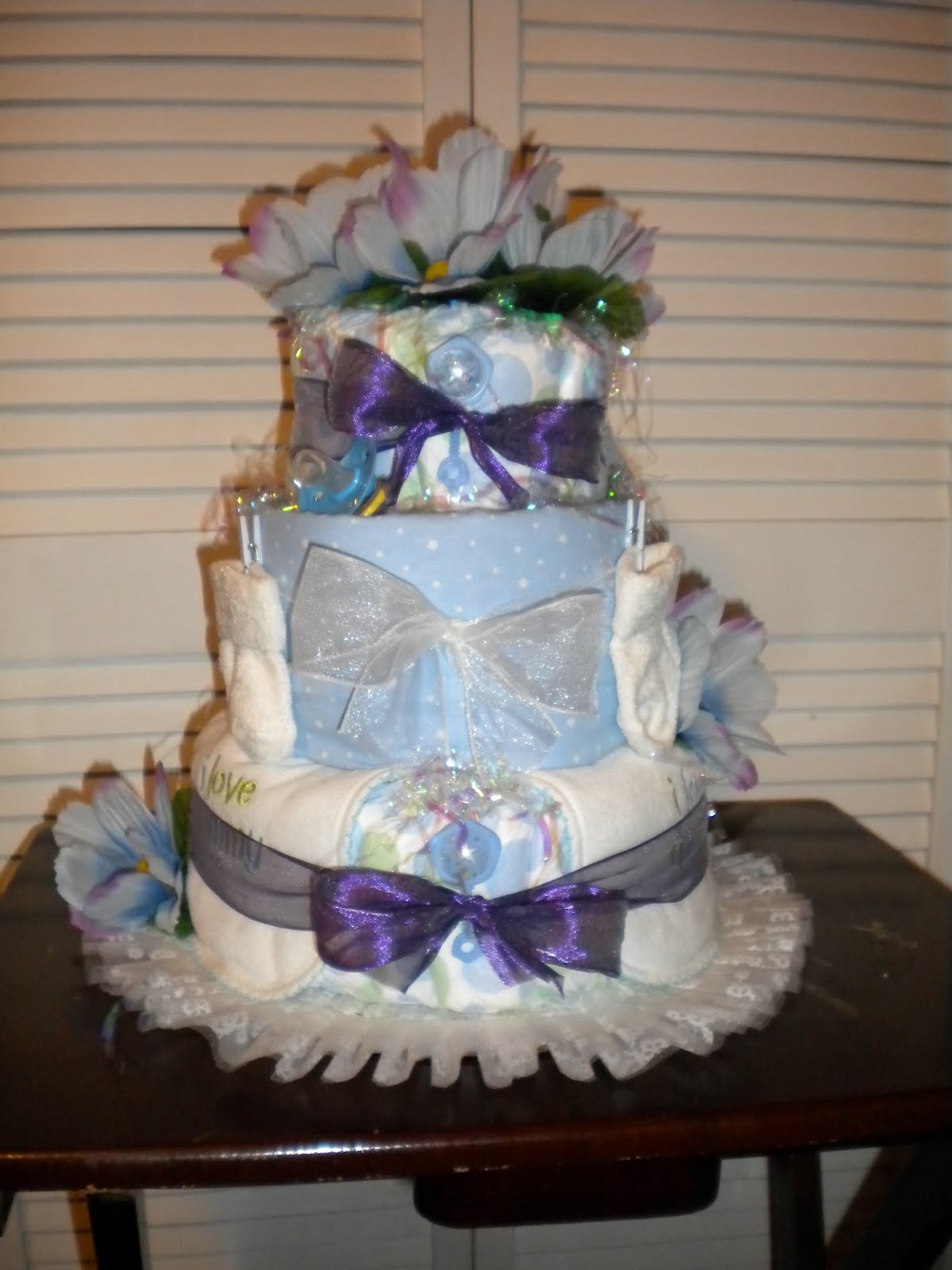 Incredible Homemade Delights Purple and Blue Diaper Cake