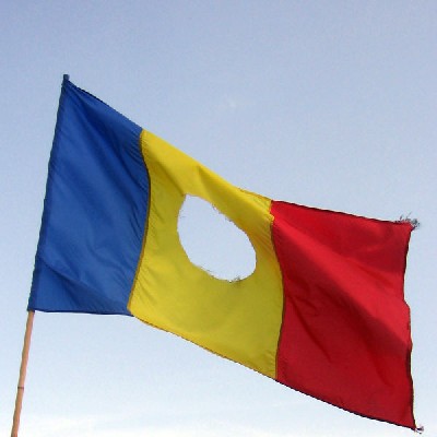 [600px-RomanianFlag-withHole.jpg]
