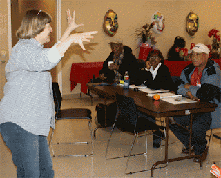 Nancy Crider entertains while training staff at residents at Lyerly housing in Houston, TX