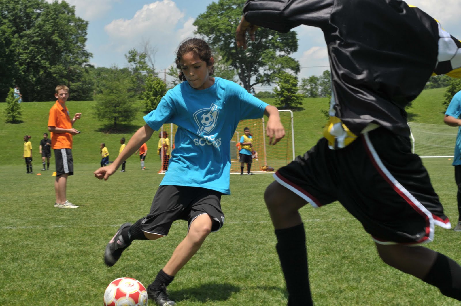 DC SCORES College soccer players provide free clinic for DC SCORES