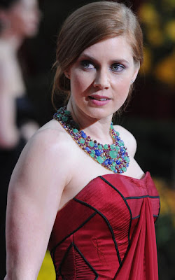 Amy Adams flashes her assets