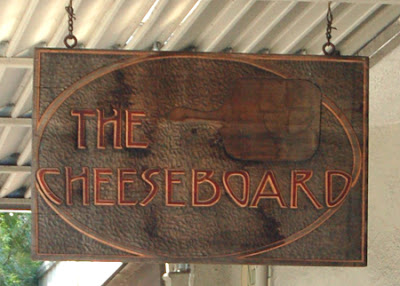 Close up of Cheeseboard's sign