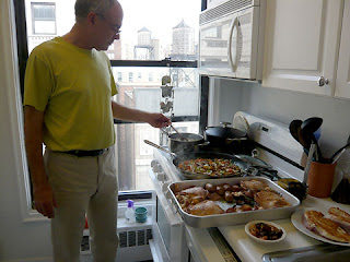 Photo of Mark Bittman cooking in his NYC kitchen by Kelly Doe