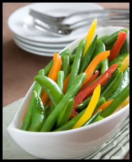 pine nut butter drizzled green beans with sweet peppers