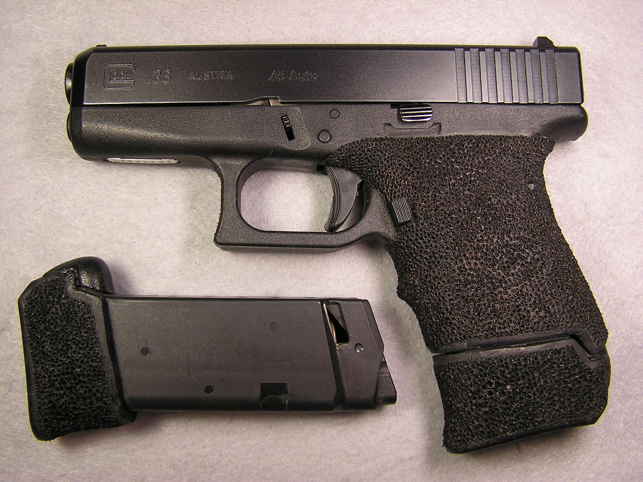 A 36 with an extended magazine would likely be the only Glock that would in...