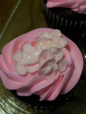 Strawberry Buttercream icing w/ edible sugar flowers