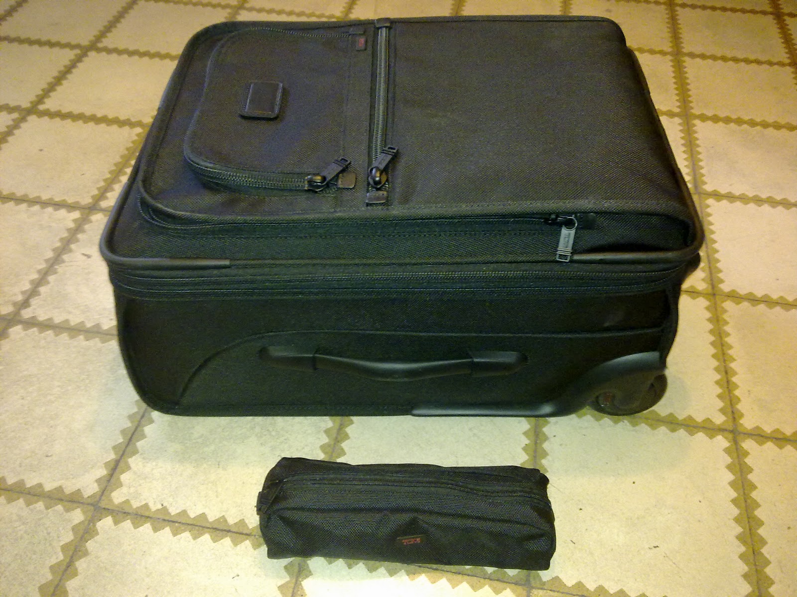 tumi alpha international