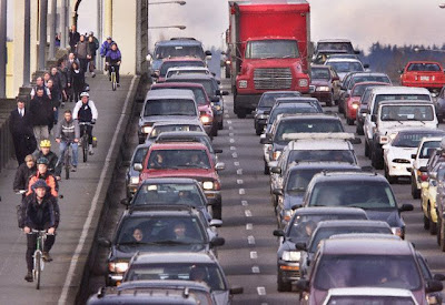 Image of bicyclists on a bridge