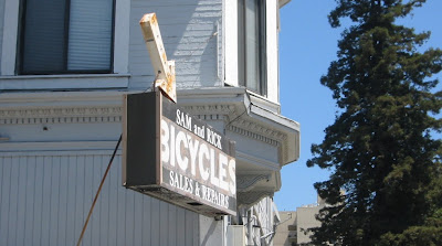 Image of bike shop sign in Oakland