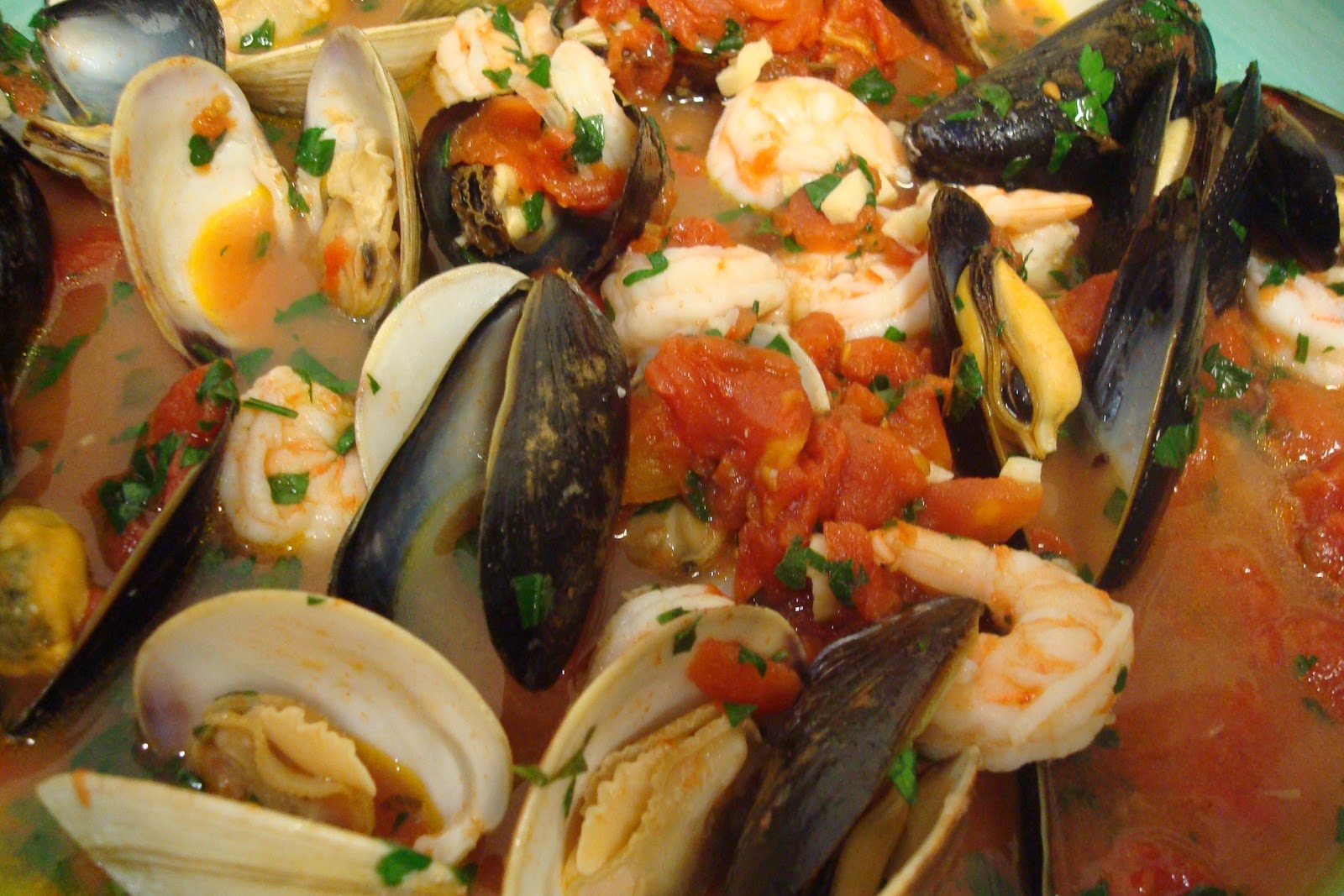 Schnitzel and the Trout Mussels, Clams and Shrimp in Spicy Broth