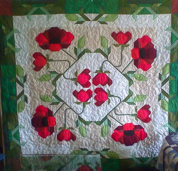 ScrappyBlue Quilts The Poppy quilt is finished