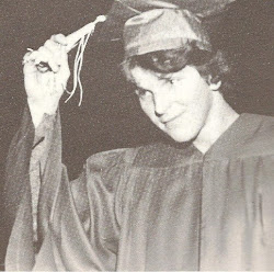 Mitch S. Happily Tosses the Tassel