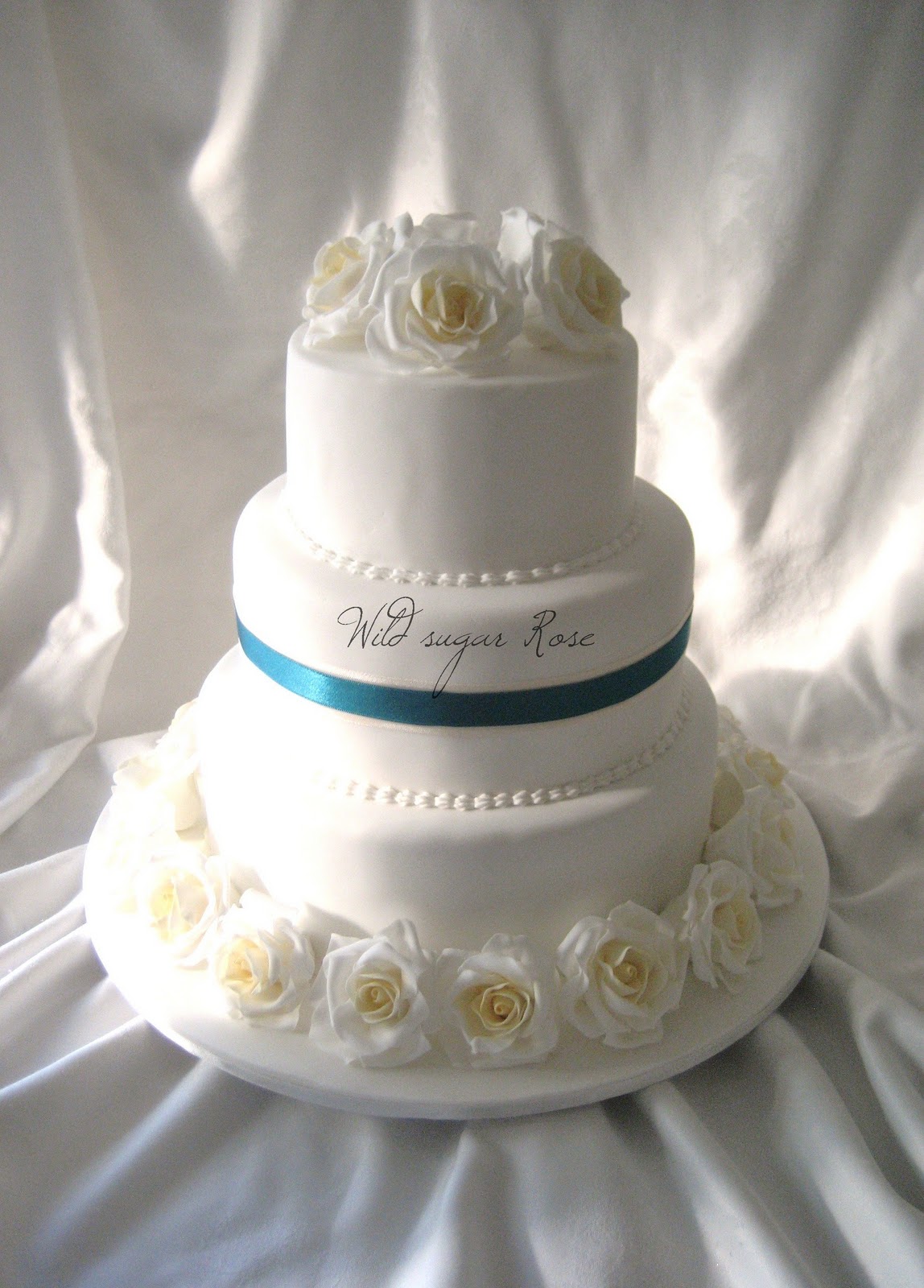 Wild sugar Rose wedding  cakes  cupcakes and cake  