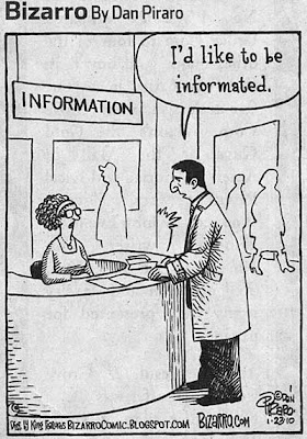 One-panel cartoon showing a man standing at an Information Desk, saying I'd like to be informated, please