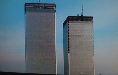 Camera pulls back in helicopter shot to reveal the Twin Towers